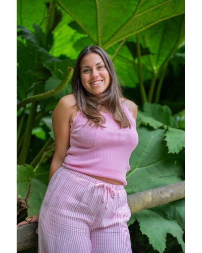 Pantalon fluide rose à rayures blanches